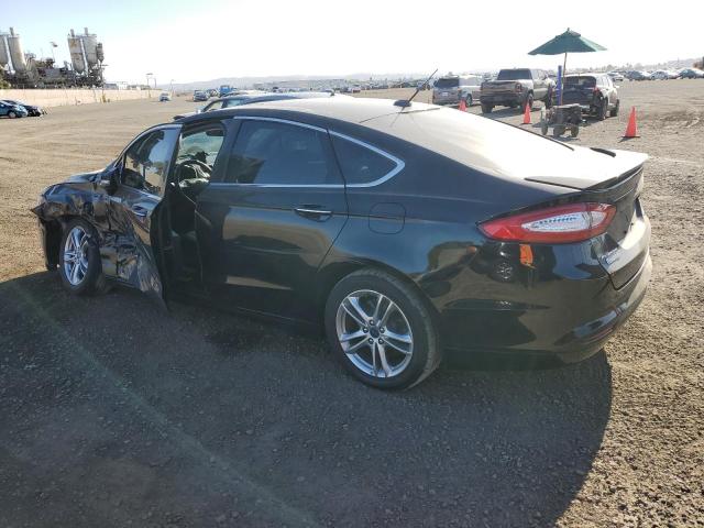 3FA6P0SU7GR320809 Ford Fusion Titanium Phev