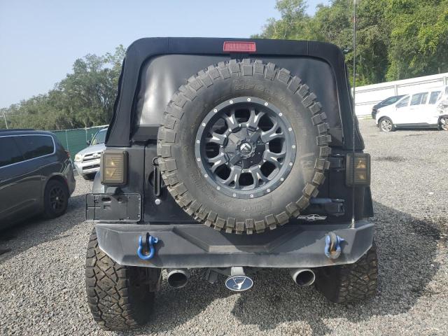 1C4BJWEG9EL266394 Jeep Wrangler Unlimited Sahara