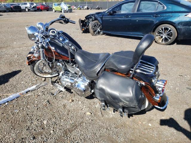 2011 HARLEY-DAVIDSON FLSTN 1HD1JD51XBB023866