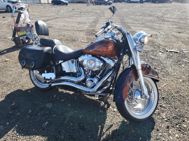 2011 HARLEY-DAVIDSON FLSTN 1HD1JD51XBB023866