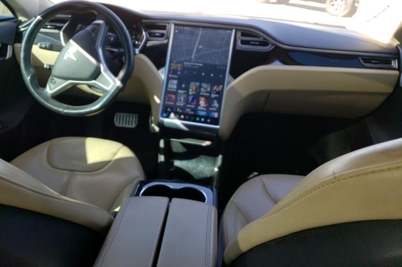 2014 Tesla Model S vin: 5YJSA1H11EFP65932