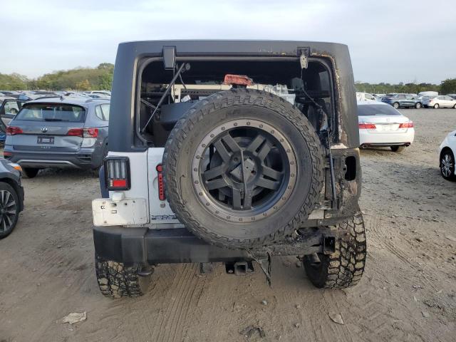 1C4BJWDG5EL115022 Jeep Wrangler Unlimited Sport