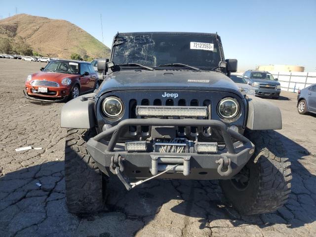 1C4BJWDG0EL126798 Jeep Wrangler Unlimited Sport