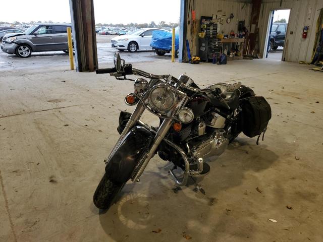 2011 HARLEY-DAVIDSON FLSTN 1HD1JD519BB035099