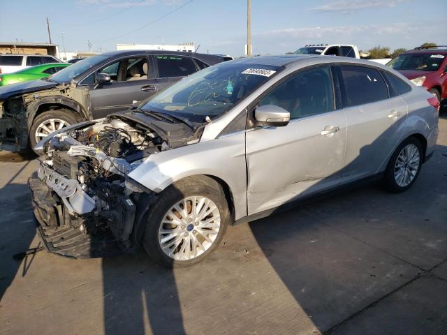 2016 Ford Focus Titanium VIN: 1FADP3J23GL309989 Lot: 70690803