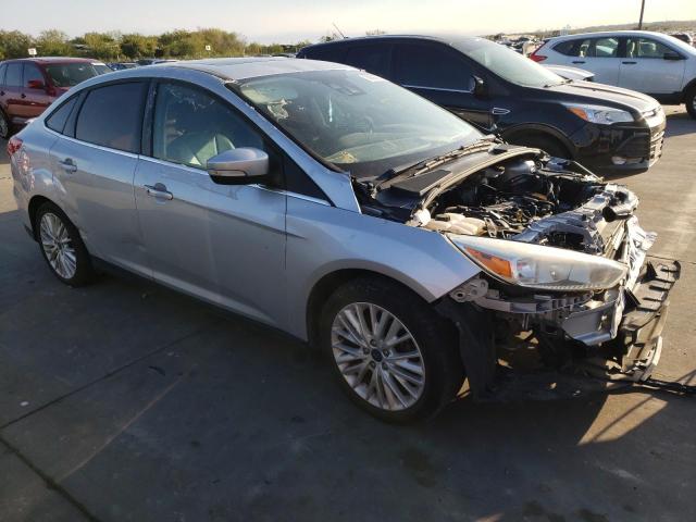 2016 Ford Focus Titanium VIN: 1FADP3J23GL309989 Lot: 70690803