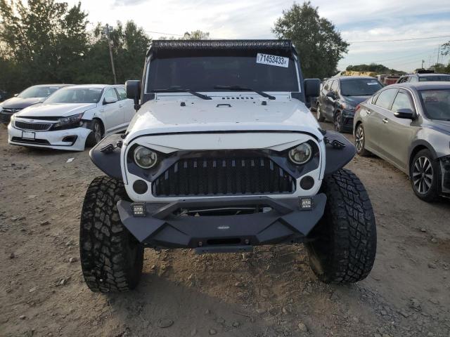1C4BJWDG5EL115022 Jeep Wrangler Unlimited Sport