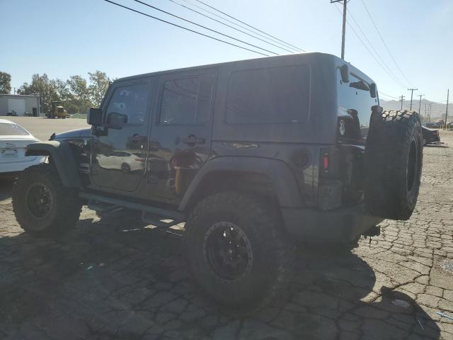 1C4BJWDG0EL126798 Jeep Wrangler Unlimited Sport