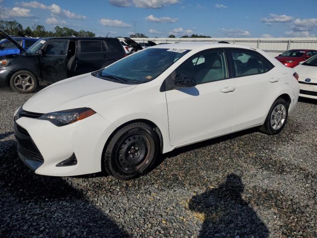 VIN 5YFBURHE2HP600439 2017 Toyota Corolla, L no.1