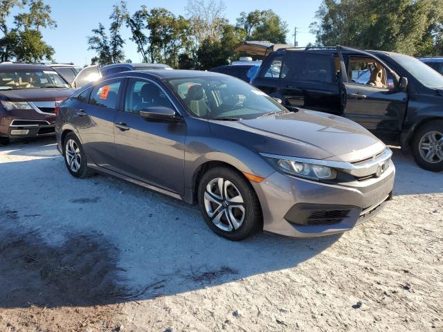 VIN 19XFC2F58GE031157 2016 Honda Civic, LX no.4