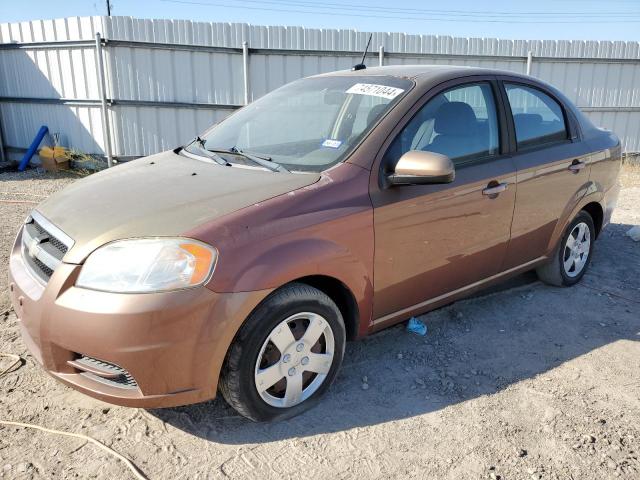 CHEVROLET AVEO LS 2011 orange sedan 4d gas KL1TD5DE9BB219686 photo #1