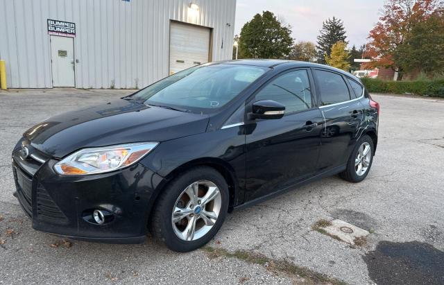 VIN 1FADP3N27DL352155 2013 Ford Focus, Titanium no.2