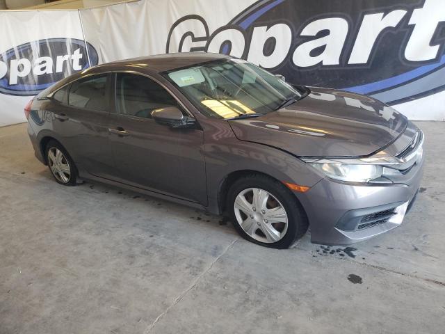 VIN 19XFC2E54GE005530 2016 Honda Civic, LX no.4