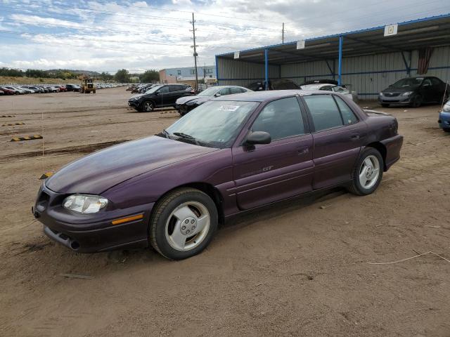 PONTIAC GRAND AM G 1997 purple sedan 4d gas 1G2NW52T3VC741682 photo #1