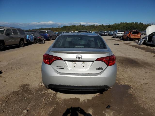 VIN 5YFBURHE8HP637088 2017 Toyota Corolla, L no.6