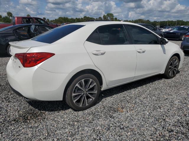 VIN 5YFBURHE9JP840982 2018 Toyota Corolla, L no.3