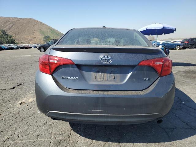 VIN 5YFBURHE7HP658661 2017 Toyota Corolla, L no.6