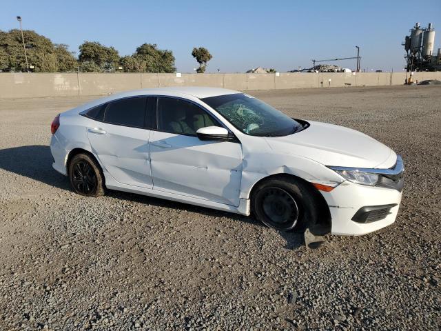 VIN 19XFC2F59HE064136 2017 Honda Civic, LX no.4