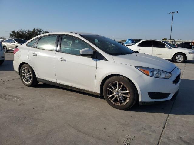 VIN 1FADP3F21JL216758 2018 FORD FOCUS no.4