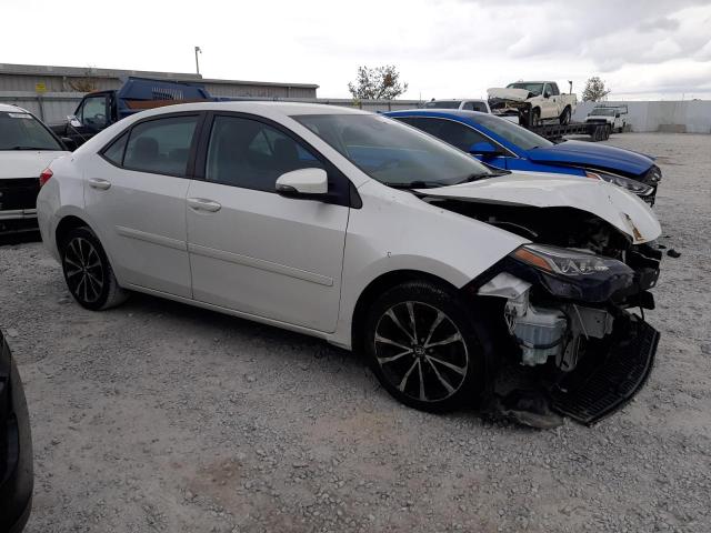 VIN 5YFBURHE3HP677790 2017 Toyota Corolla, L no.4