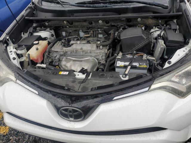 VIN JTMZFREV5JJ741240 2018 Toyota RAV4, LE no.11