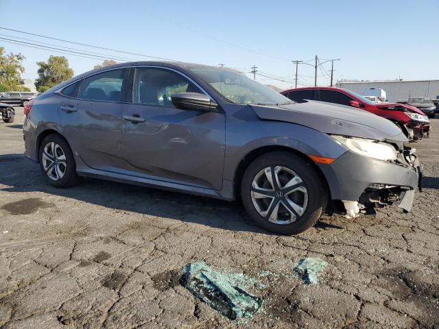 VIN 19XFC2F51GE205232 2016 Honda Civic, LX no.4