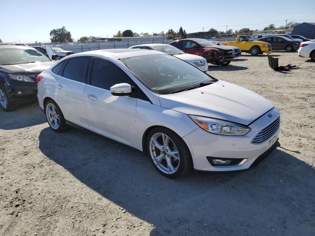 VIN 1FADP3J22GL227414 2016 Ford Focus, Titanium no.4