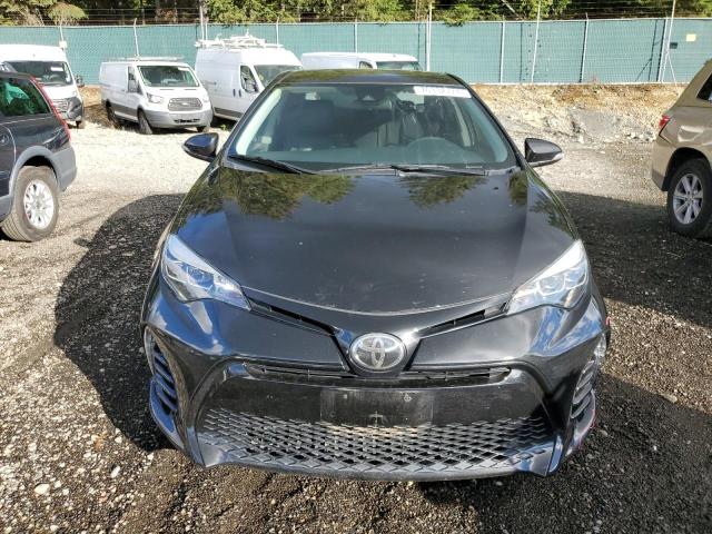 VIN 5YFBURHE5JP823449 2018 Toyota Corolla, L no.5