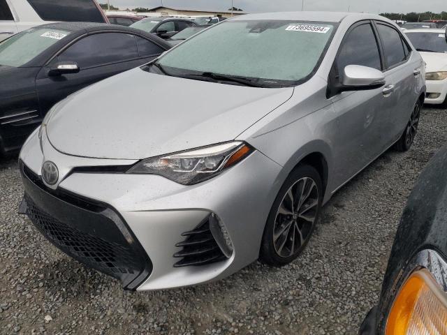 VIN 5YFBURHE2KP863473 2019 Toyota Corolla, L no.1