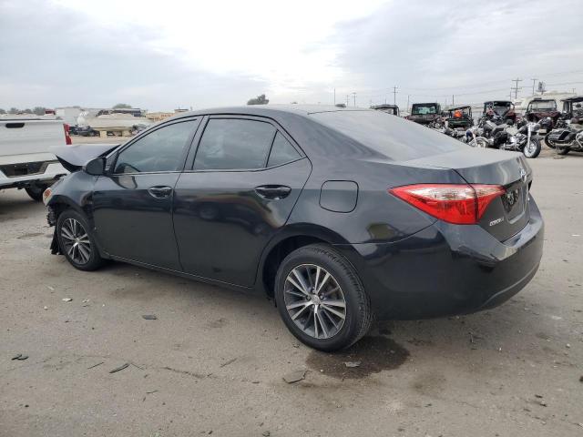 VIN 5YFBURHE8KP884151 2019 Toyota Corolla, L no.2