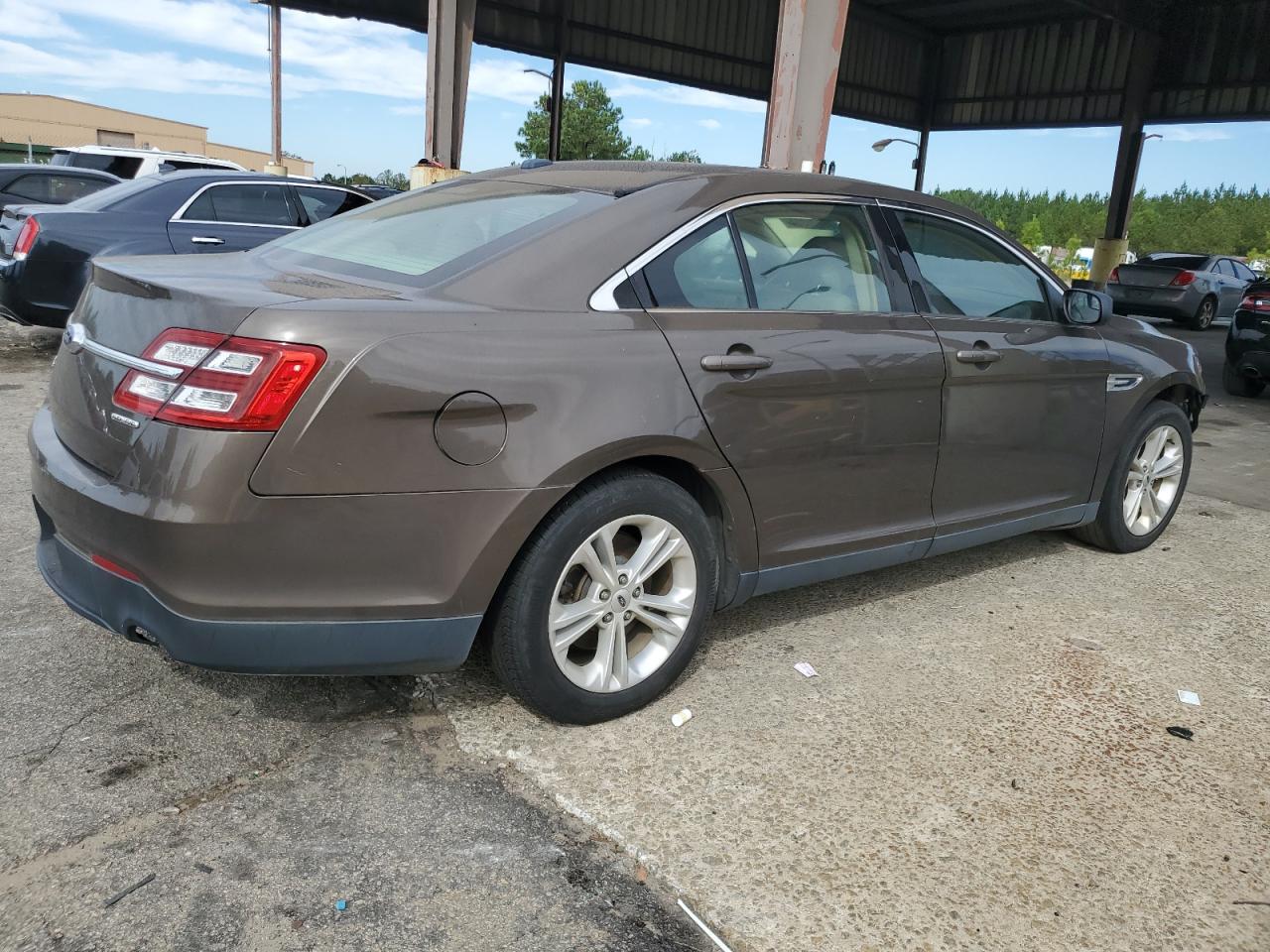 FORD TAURUS SE 2016 black sedan 4d gas 1FAHP2D80GG113013 photo #4