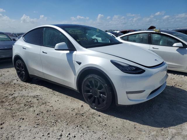 VIN 7SAYGDEE5PA031587 2023 Tesla MODEL Y no.4