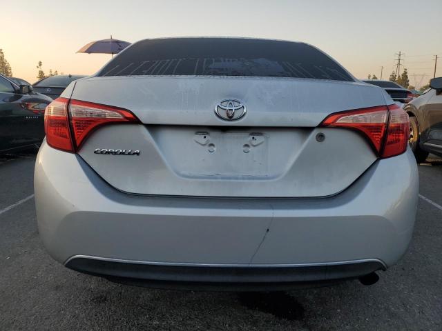 VIN 5YFBURHEXHP584295 2017 Toyota Corolla, L no.6