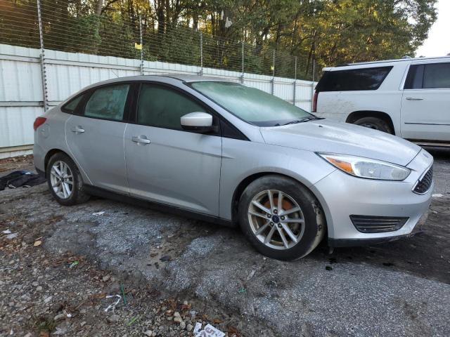 VIN 1FADP3F2XJL214247 2018 Ford Focus, SE no.4