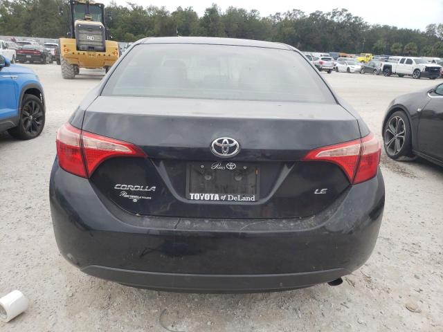 VIN 5YFBURHE5HP735057 2017 Toyota Corolla, L no.6