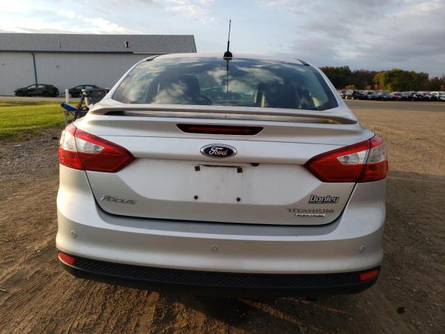 VIN 1FADP3J21EL404581 2014 Ford Focus, Titanium no.6