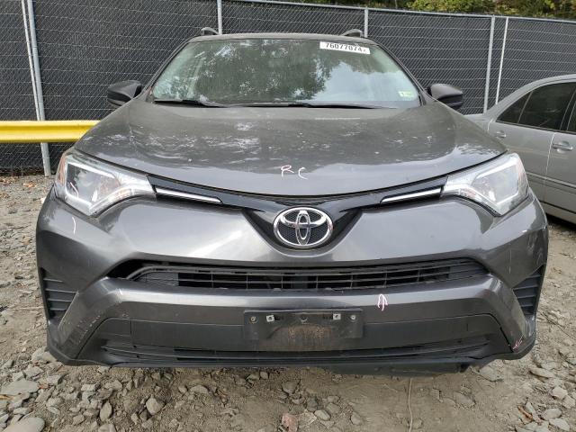 VIN JTMBFREV8GJ096187 2016 Toyota RAV4, LE no.5