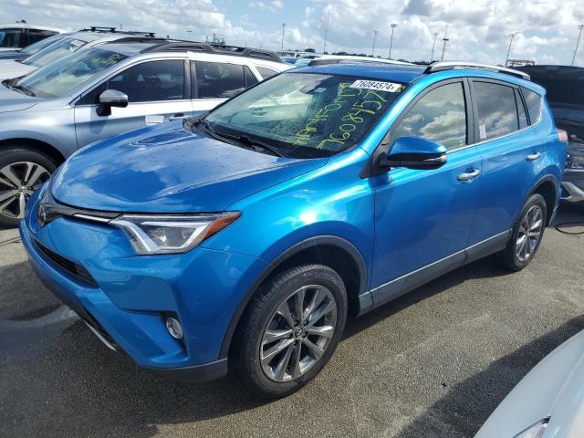 VIN JTMYFREV9JJ203183 2018 Toyota RAV4, Limited no.1