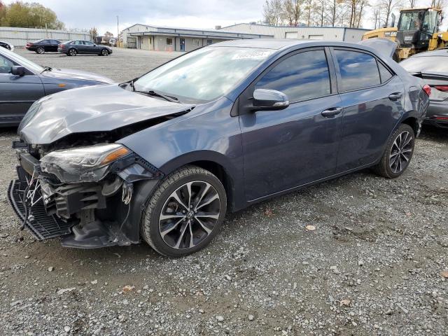 VIN 5YFBURHE5JP753774 2018 Toyota Corolla, L no.1