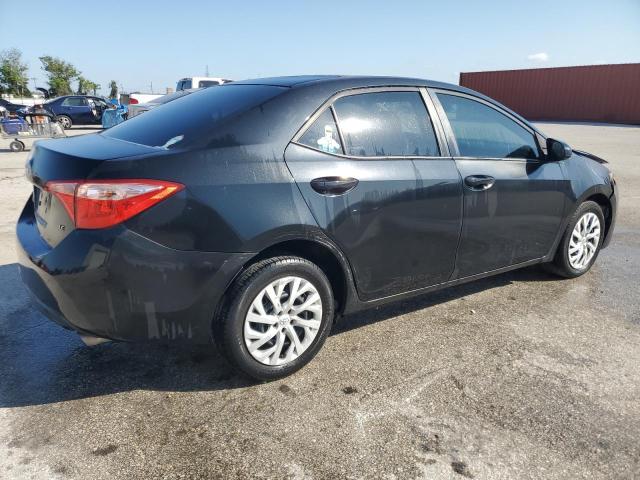 VIN 5YFBURHE2JP769219 2018 Toyota Corolla, L no.3