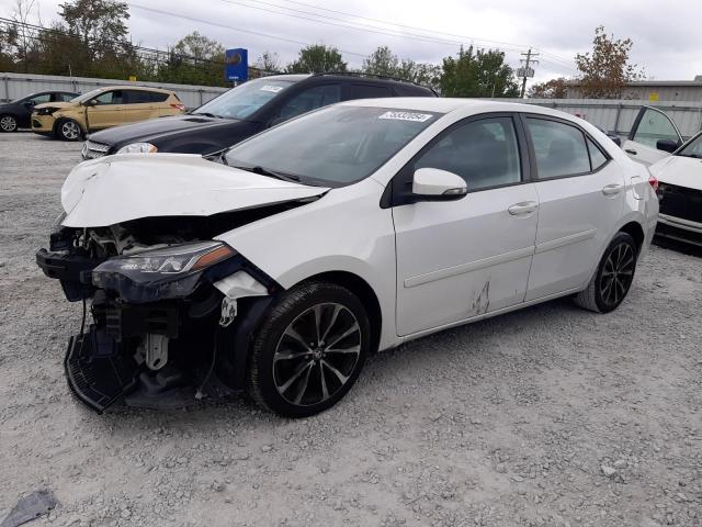 VIN 5YFBURHE3HP677790 2017 Toyota Corolla, L no.1