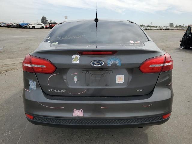 VIN 1FADP3F2XHL329358 2017 Ford Focus, SE no.6