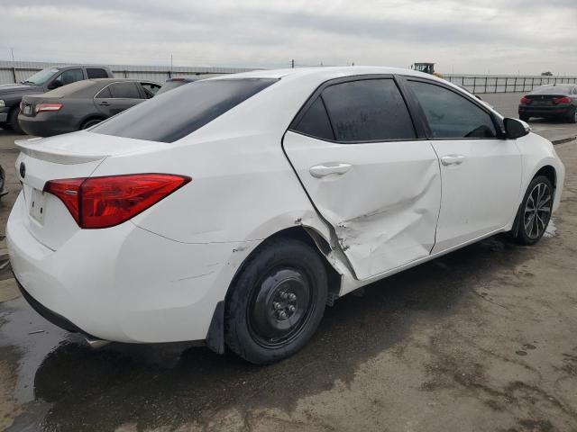 VIN 5YFBURHE5HP692775 2017 Toyota Corolla, L no.3