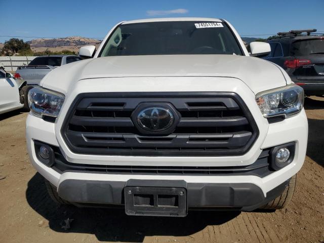 VIN 5TFAZ5CN7JX058596 2018 Toyota Tacoma, Double Cab no.5