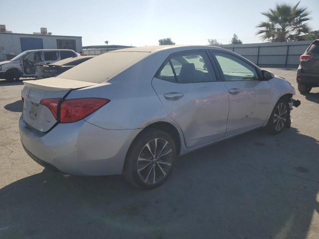 VIN 5YFBURHE6HP627921 2017 Toyota Corolla, L no.3