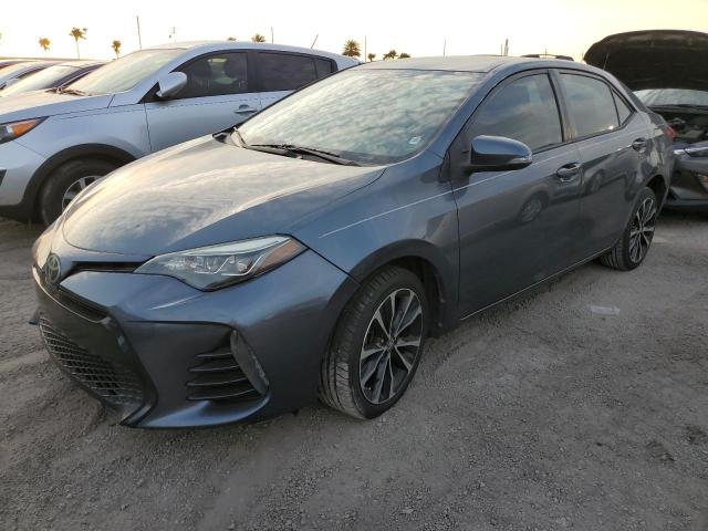 VIN 5YFBURHE4HP618621 2017 Toyota Corolla, L no.1