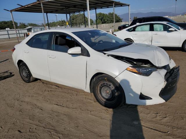 VIN 5YFBURHE6HP679789 2017 Toyota Corolla, L no.4