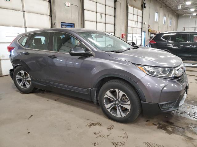 VIN 2HKRW6H33KH217247 2019 Honda CR-V, LX no.4