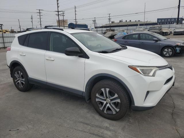 VIN JTMZFREV9HJ131321 2017 Toyota RAV4, LE no.4