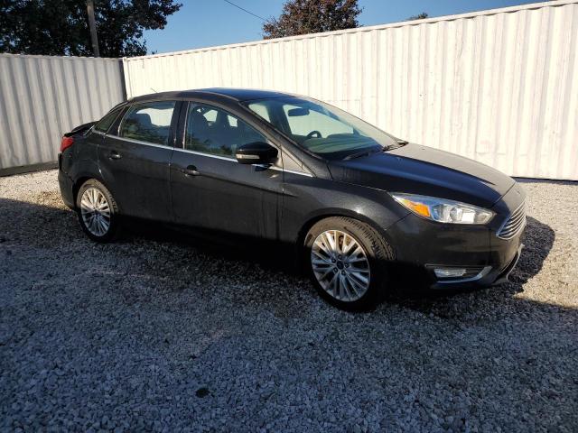 VIN 1FADP3J22FL312784 2015 Ford Focus, Titanium no.4